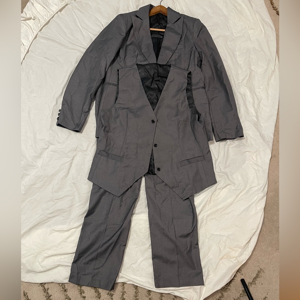 Gray three-piece women’s business suit. US Size 12. Brand new. Brand: WHCQ